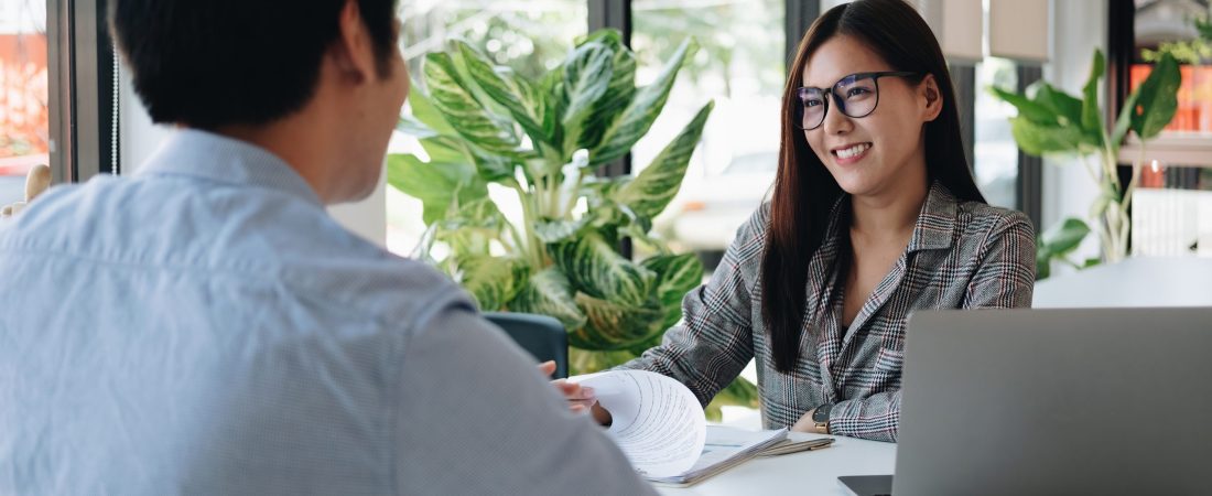 Employer or recruiter reading a resume during about colloquy his profile of candidate, employer conducting a job interview, manager resource employment and recruitment concept